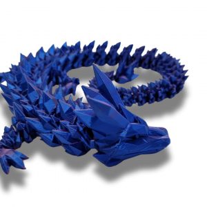 rystal flexi dragon curled up on desk – fantasy themed fidget toy