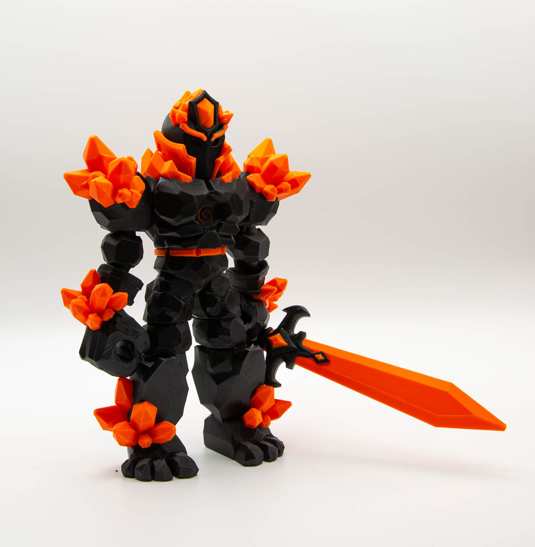 Crystal Warrior articulated 3D printed figure with sword in black and orange