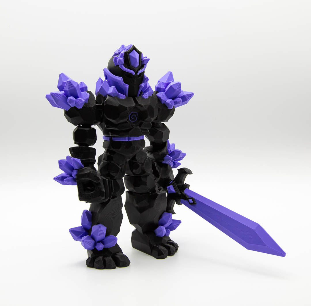 Crystal Warrior articulated 3D printed figure with sword in black and purple
