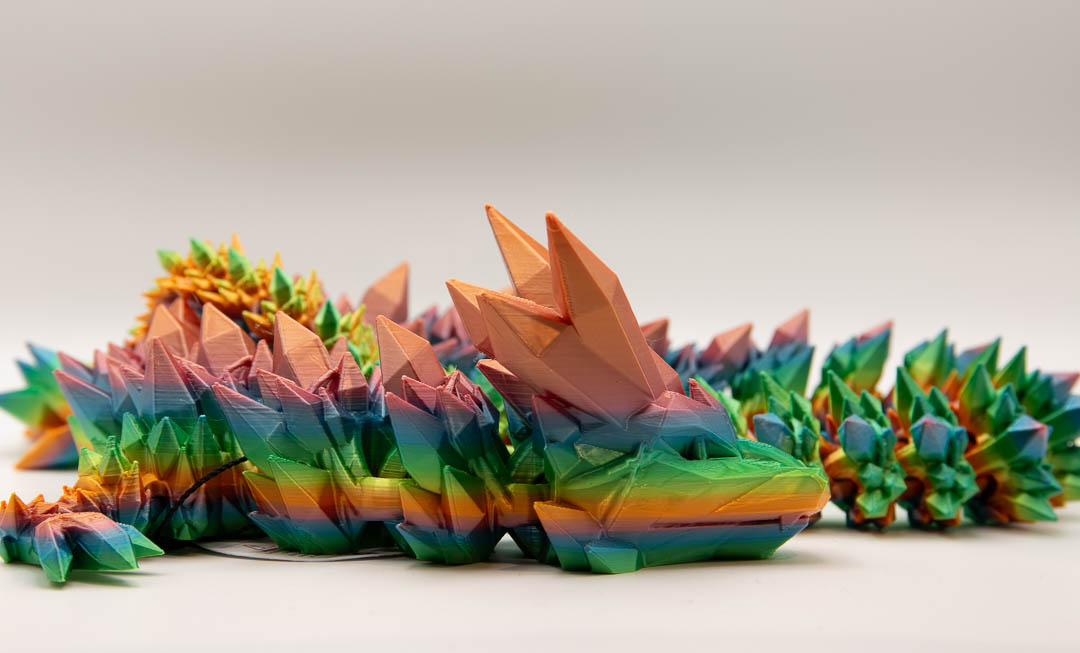 Rainbow crystal flexi dragon – 3D printed articulated dragon fidget