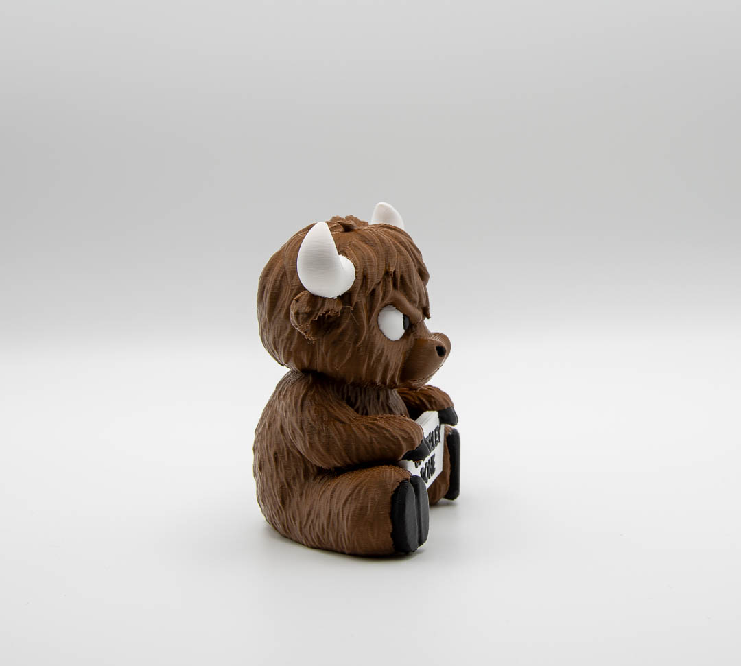 Udderly Done Highland cow ornament, side view
