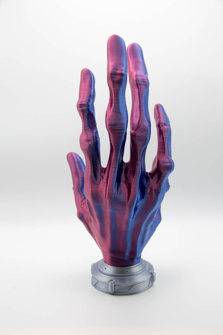 Alien hand controller holder showing the red side of the silk colour shift