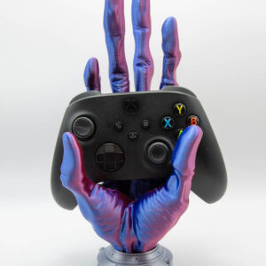 Alien hand controller holder holding an Xbox controller