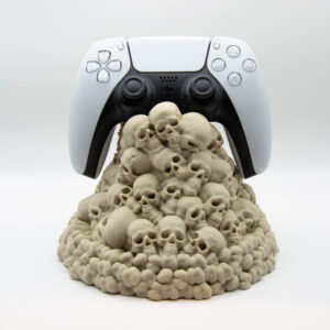 Skull pile controller holder holding a PS5 controller
