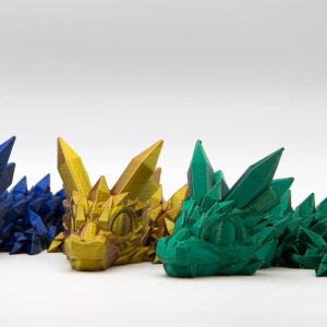 Small crystal dragons in blue, gold and green silk