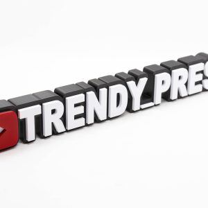 Personalised 3D printed YouTube channel name sign for a creator desk